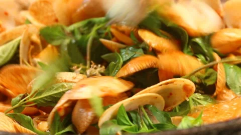 Frying clams with chili paste in pan , Thai street food. Stock Footage 146579753