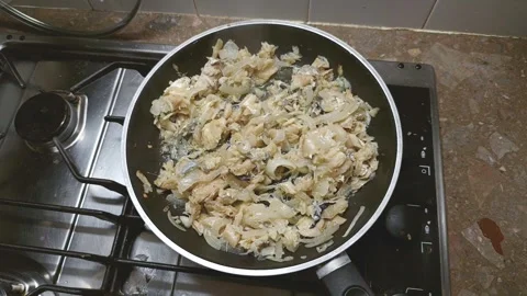 Frying cod fish with onion Video stock 325843594