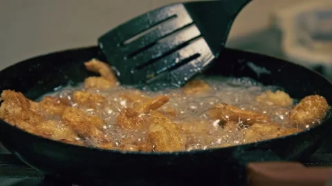 Frying Crispy Golden Shrimp in Pan, Crunchy Seafood Cooking, 6K Footage Stock Footage 325462911