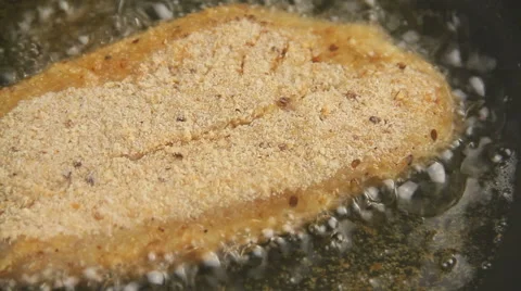 Frying Crumbed Fish Fillet Stock Footage 61200029