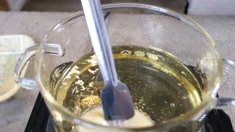 Frying donut, preparing donut at home Stock Footage 204874482