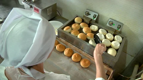 Frying donuts in boiling oil Stock-Footage 99613934
