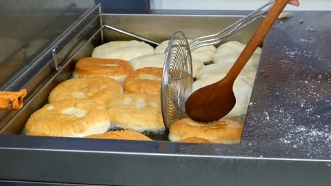 Frying the donuts Stock Footage 95894235