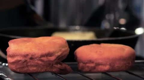 Frying donuts in a kitchen, detail of a kitchen, sweet dessert Stock Footage 68908995