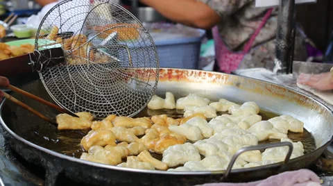 Frying dough stick in a hot pan Video stock 38116701