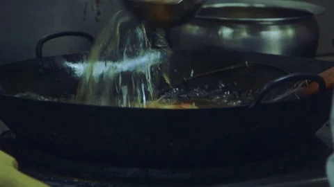 Frying a duck Stock Footage 78018757