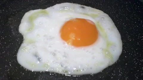 Frying Egg In Pan Slow Motion Stock Footage 161532301