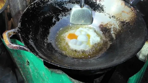 Frying Egg in Wok at Thai Street Food Stall Stock Footage 330847463