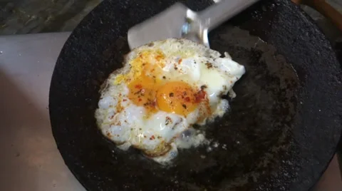 Frying Eggs close up Video stock 33653666
