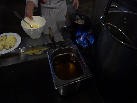 Frying eggs Stock Footage 126475247