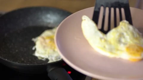 Frying Eggs Stock Footage 235471352