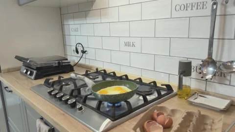 Frying Eggs In Pan On Gas Stove Morning Breakfast Cooking At Home Kitchen Close 스톡 동영상 336449870