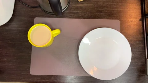 Frying eggs on the pan overhead view pouring coffee in the mug Stock Footage 201863946