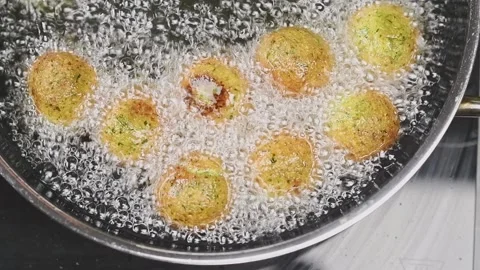 Frying of falafel in a frying pan. Stock Footage 159811081