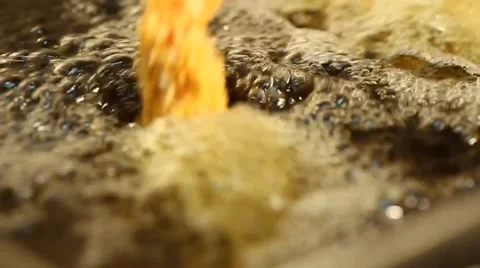 Frying Fish in Deep Oil Close Up Stock Footage 49501428