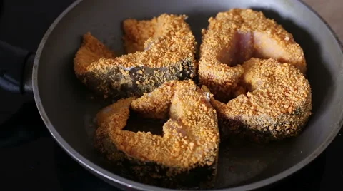 Frying fish in a frying pan Stock Footage 50962770