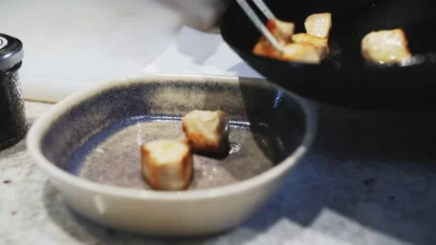 Frying fish in a frying pan Stock Footage 168944442