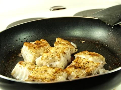 Frying fish, frying pan Foto stock