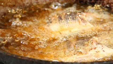 Frying  fish in pan Stock Footage 88813243