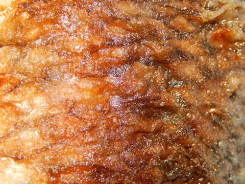 Frying fish in a pan 스톡 사진