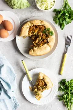 Frying flatbread filled with herbs and cheese. Stock Photos