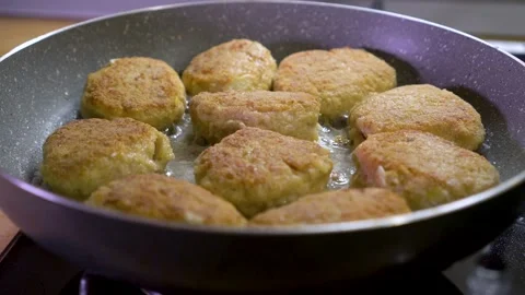 Frying fresh delicious meat balls on a hot pan 스톡 동영상 135356523