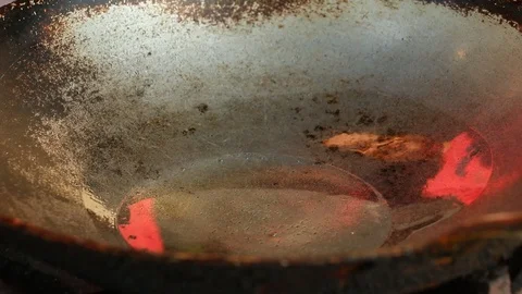 Frying garlic and chili  in pan Stock Footage 101673104