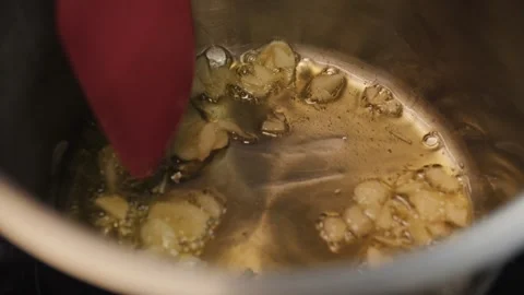 Frying the garlic. Close up view. Stock-Footage 273234557