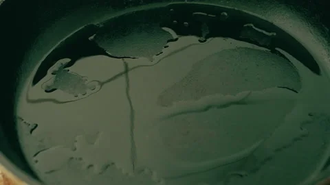 Frying garlic on cooking pan Stock Footage 135273111