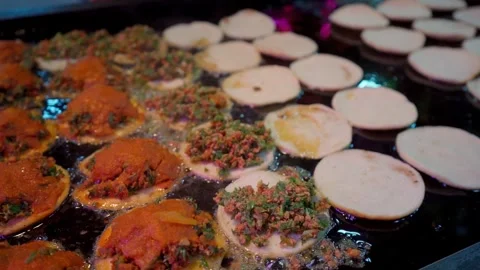 Frying garnachas with ground beef and red sauce, traditional food Stock Footage 295450714