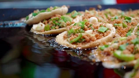 Frying garnachas in oil - close-up Stock Footage 295401649