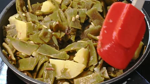 Frying green beans with potato and dressing Stock Footage 219875660
