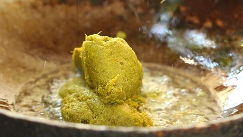 Frying green  curry paste   in pan to make green curry, Thai famous food Stock Footage 120396354