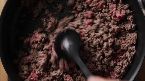 Frying Ground Beef in Pan Close Up Top View Видео 336572446
