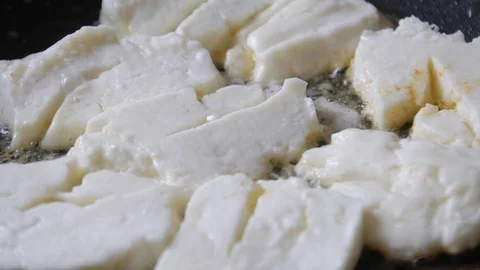 Frying halloumi chesse Stock Footage 91140134