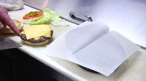 Frying hamburger patty Stock Footage 907588