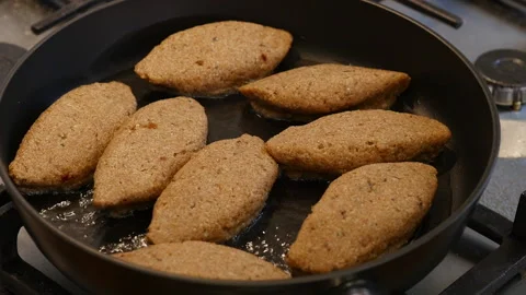 Frying home made pies  Stock Footage 217442589