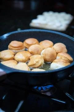 Frying Homemade Donuts Stock Photos