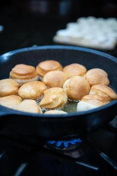 Frying Homemade Donuts Stock Photos