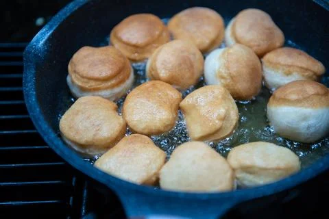Frying Homemade Donuts Stock Photos
