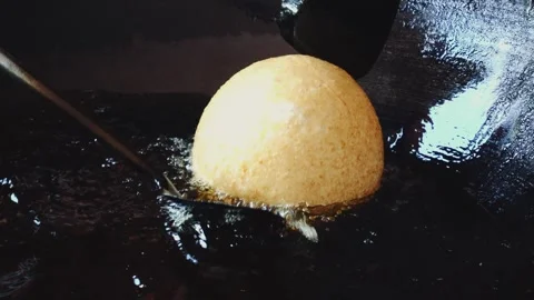 Frying Large Doughnut Pastry in Pan Indoors in Vietnam Stock Footage 340015782