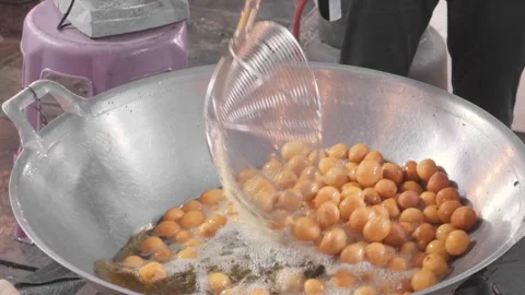 Frying of lokma balls in vat with boiling oil, street food 스톡 동영상 278997646