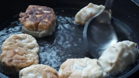 Frying manti Stock Footage 113527514