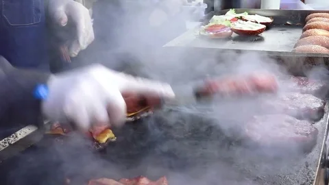 Frying meat for burger Stock Footage 82974233