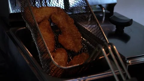 Frying Meat in Deep Fryer Stock Footage 319207788