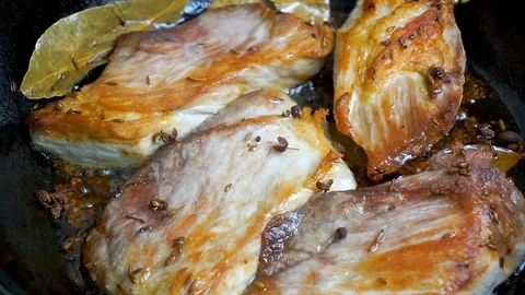 Frying meat Stock Footage 108878942