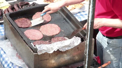 Frying meat for hamburgers Stock Footage 37340983