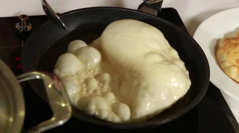 Frying meat pasty in a pan Stock Footage 49783660