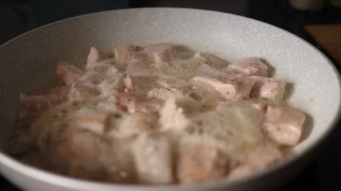 Frying Meat Pieces - Making Chicken Nuggets at Home Stock Footage 315342638