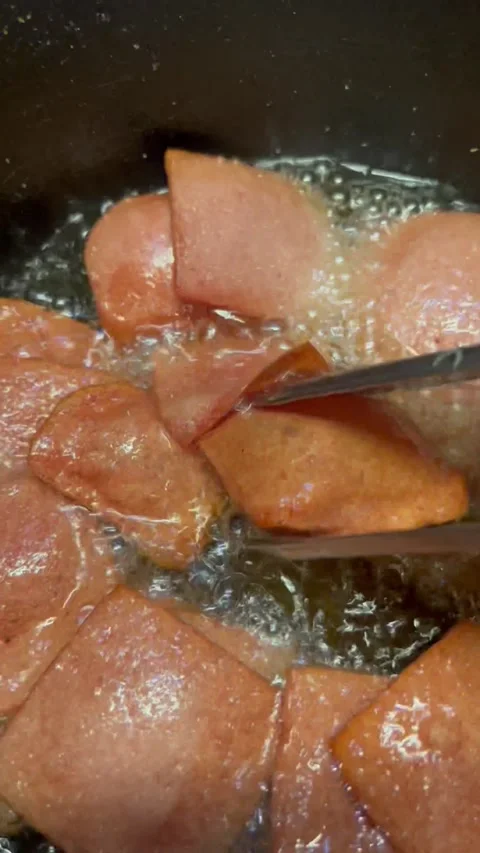 Frying Meat Slices in Hot Oil Stock Footage 345304997